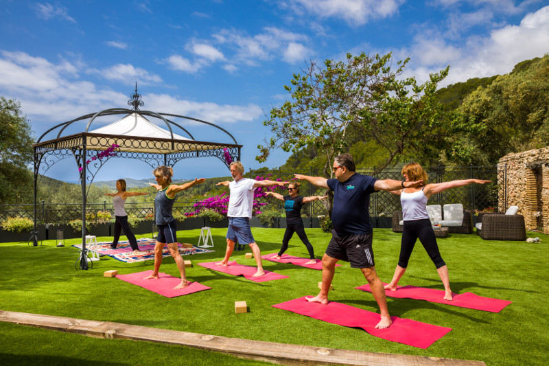 Yoga on the lawn at Can Marcer de la Penya